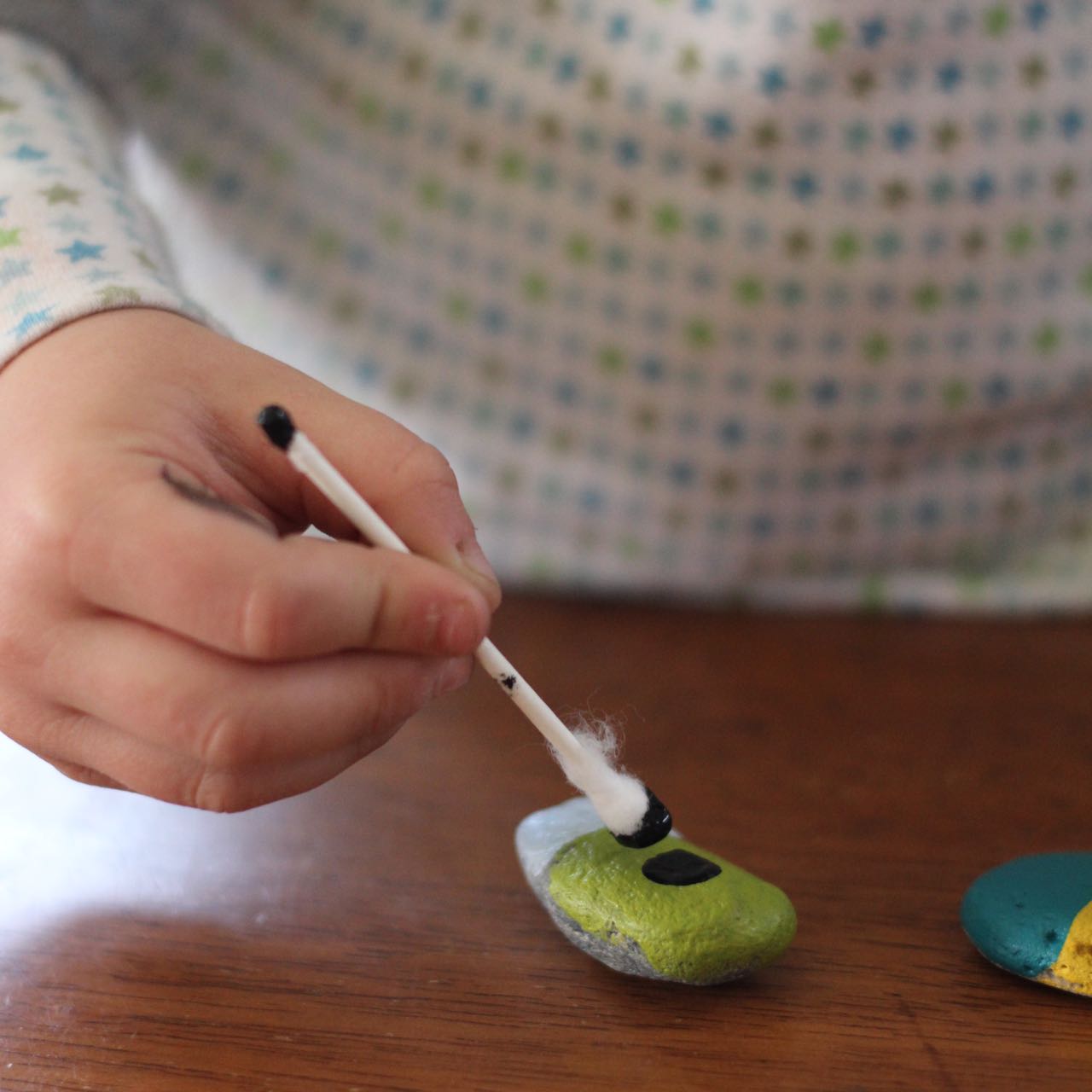 Carefully-adding-domino-dots