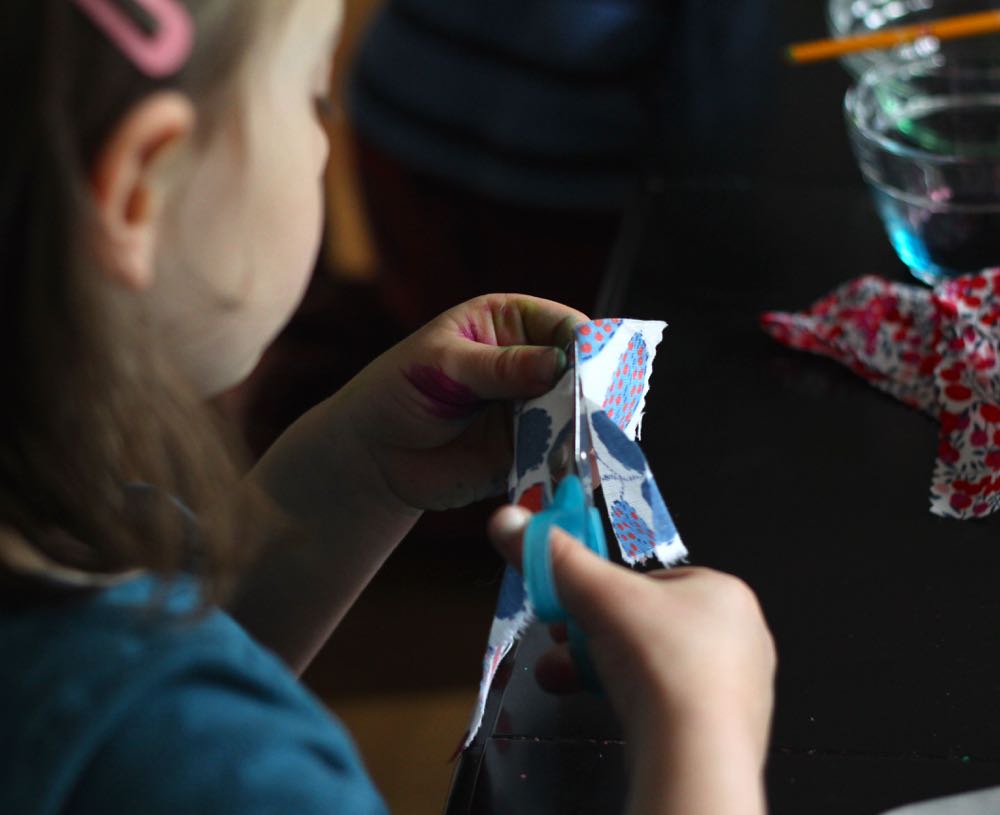 Cutting-fabric-to-create-peg-doll-clothes