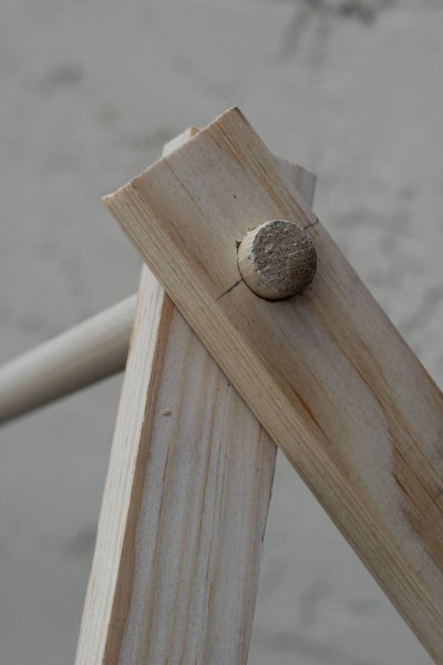 Inserting-the-Dowels-for-the-Collapsible-Play-Tent-400x600