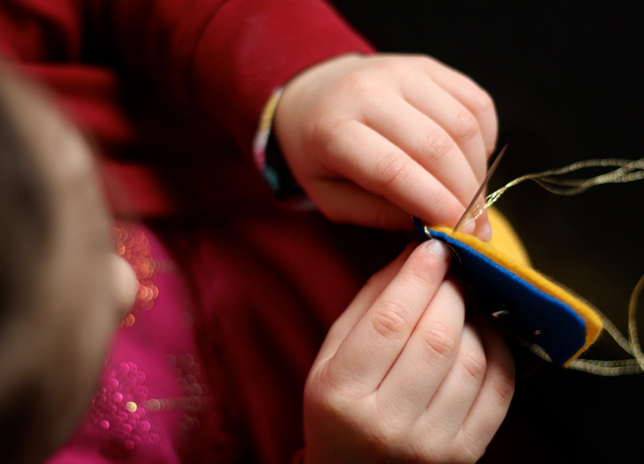 Sewing-up-a-little-toy-mouse