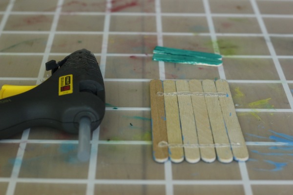 Sparkle-Stories-Gluing-together-the-Popsicle-Sticks-for-the-Fairy-Door-600x400