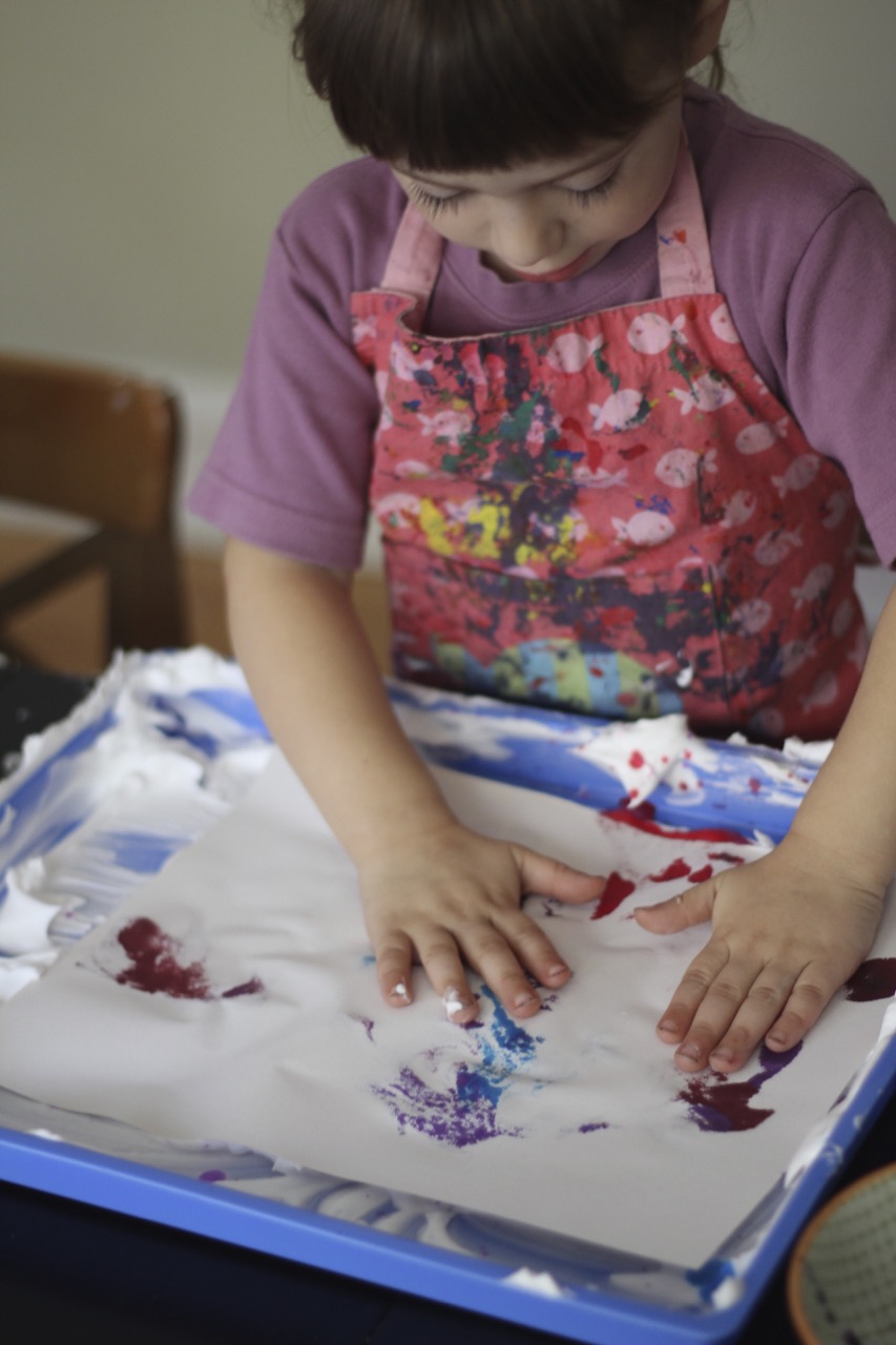 laying-down-paper-while-making-Magical-Marbled-Paper-art