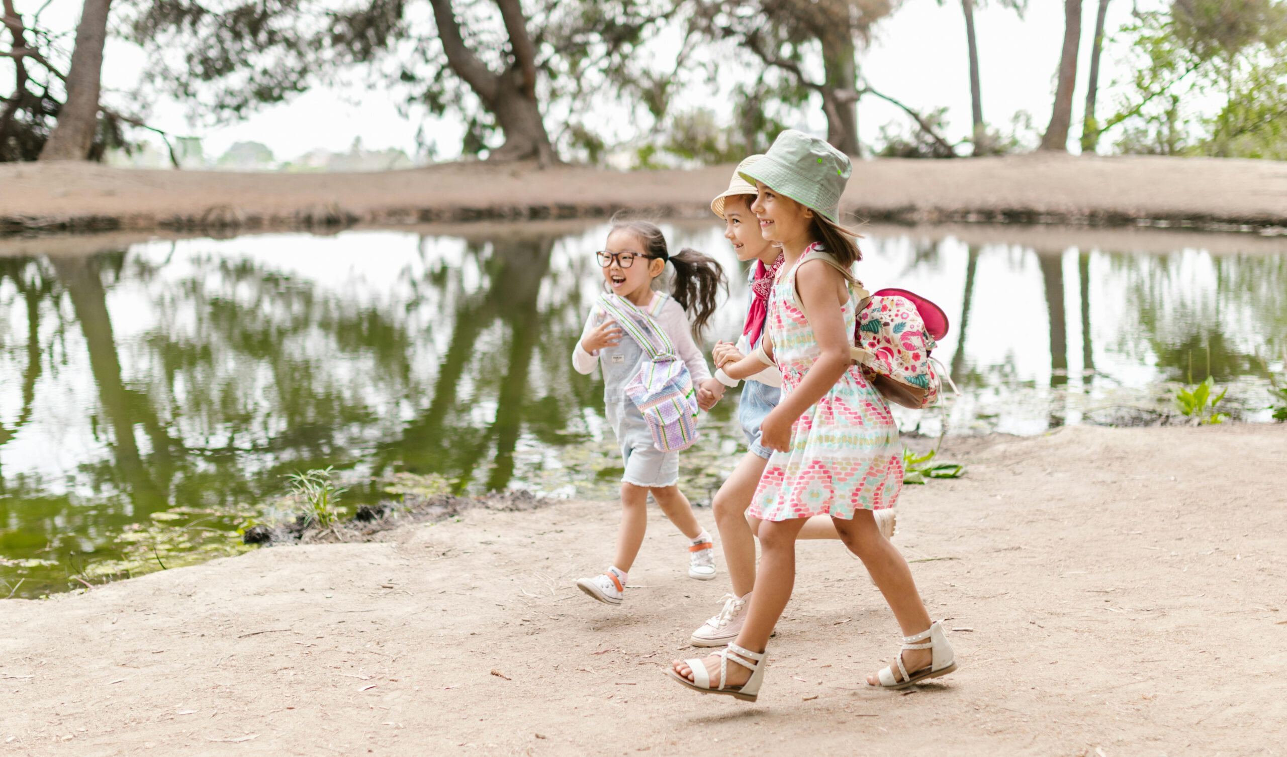 girls walking pond 1200 banner