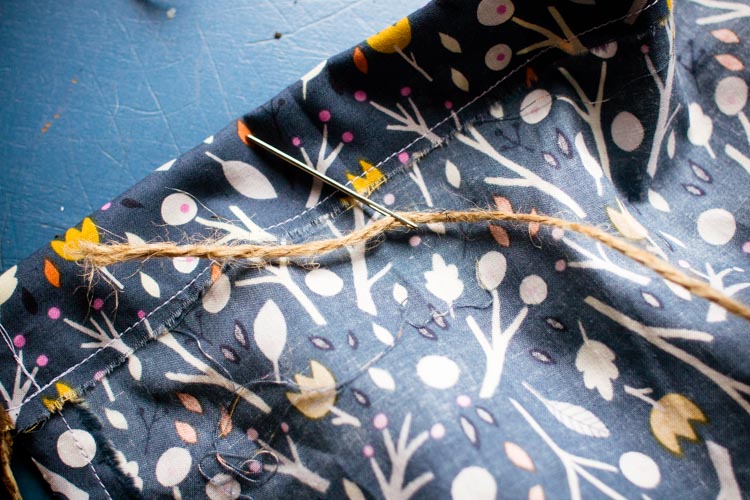 getting ready to thread twine through the top